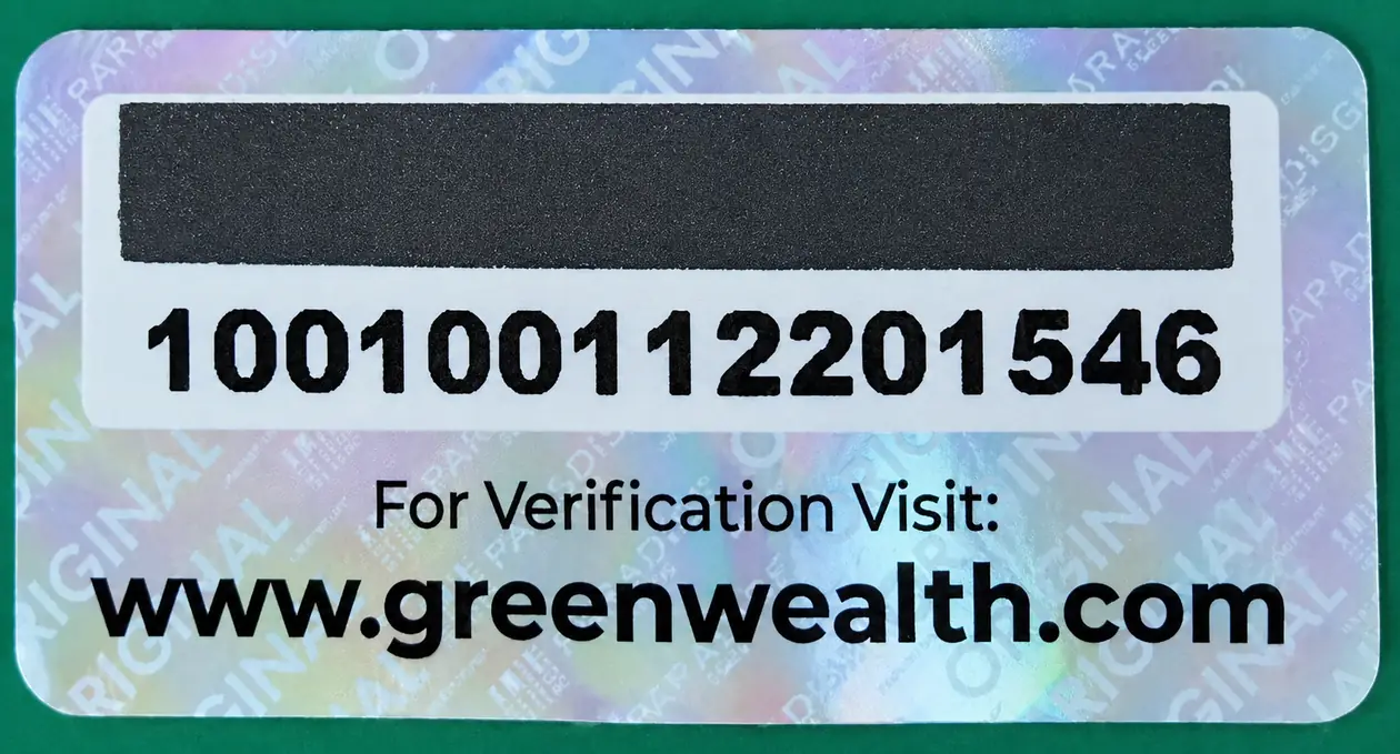 Genuine Green Wealth Neo Hair Lotion holographic authenticity sticker: black scratch-off panel hiding the 12 digit verification code, with the printed public serial number below